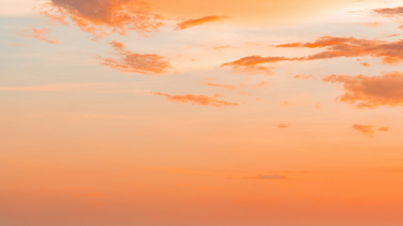 Sunset over the Atlantic with a boat on the horizon